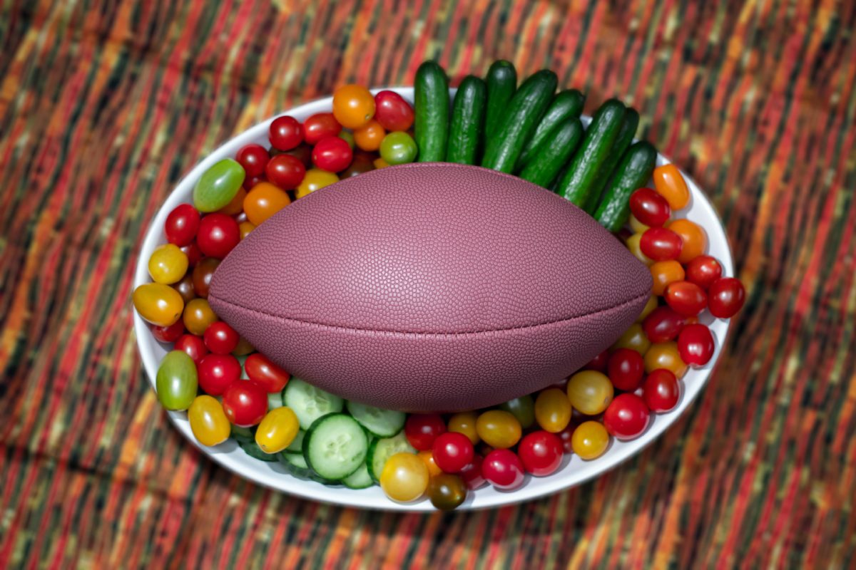 Football and veggie tray together 