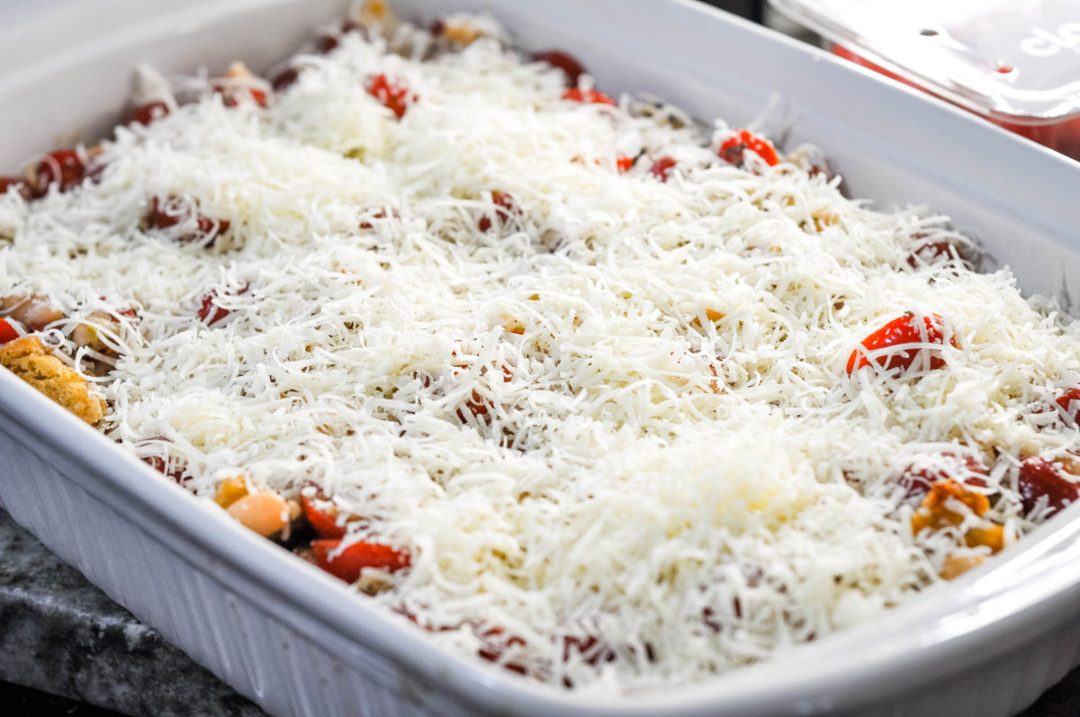 tomato casserole with shredded cheese on top