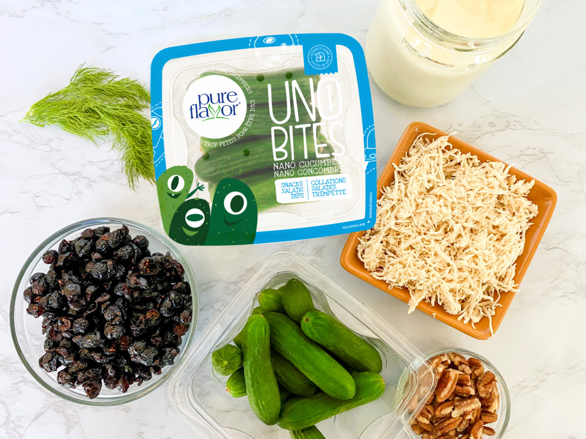 pack of Uno Bites nano cucumbers with other salad ingredients