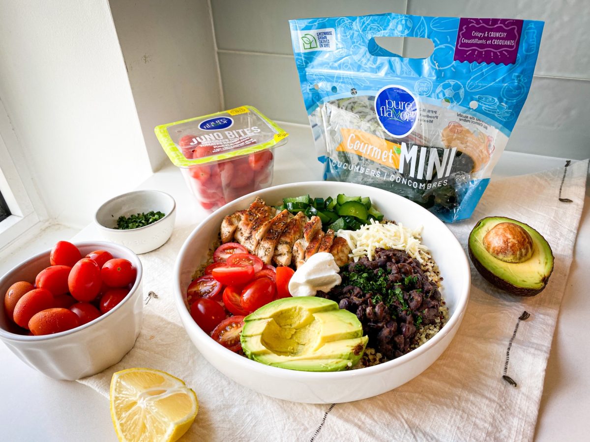 Veggie Quinoa Buddha Bowl with mini cucumbers and red grape tomatoes