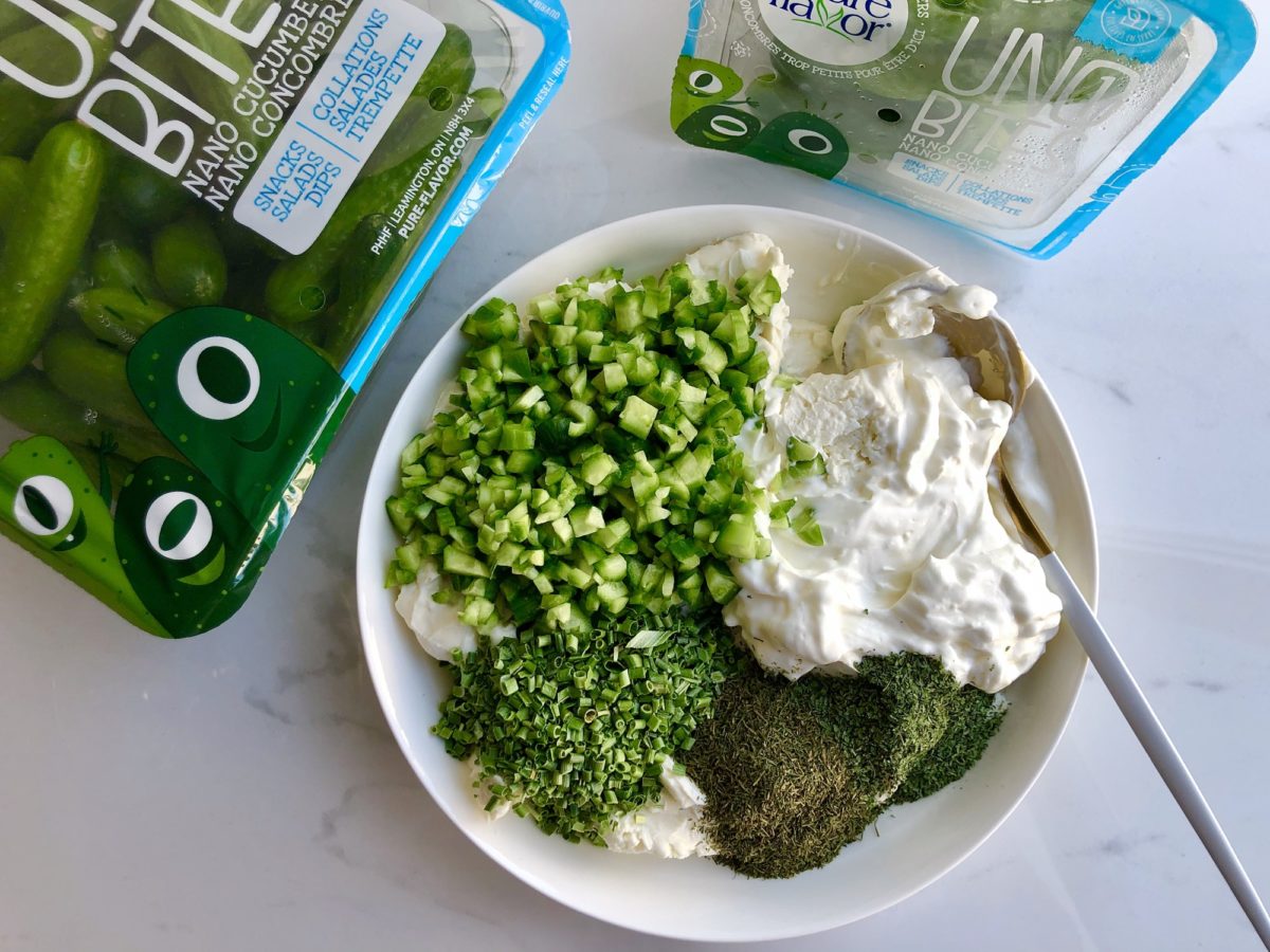 mixing ingredients for cucumber and herb dip