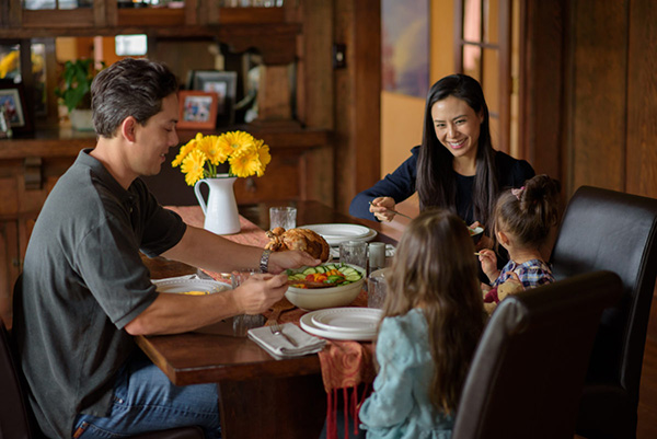 Family sitting at dinner together