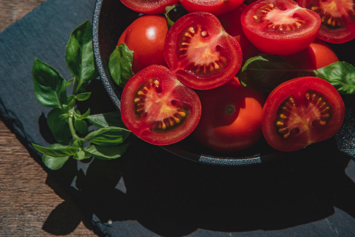 Cut Organic Luna Sweets Cocktail Tomatoes in a bowl