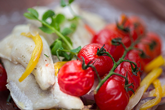 yellow perch with RedRoyals™ cherry tomatoes on-the-vine
