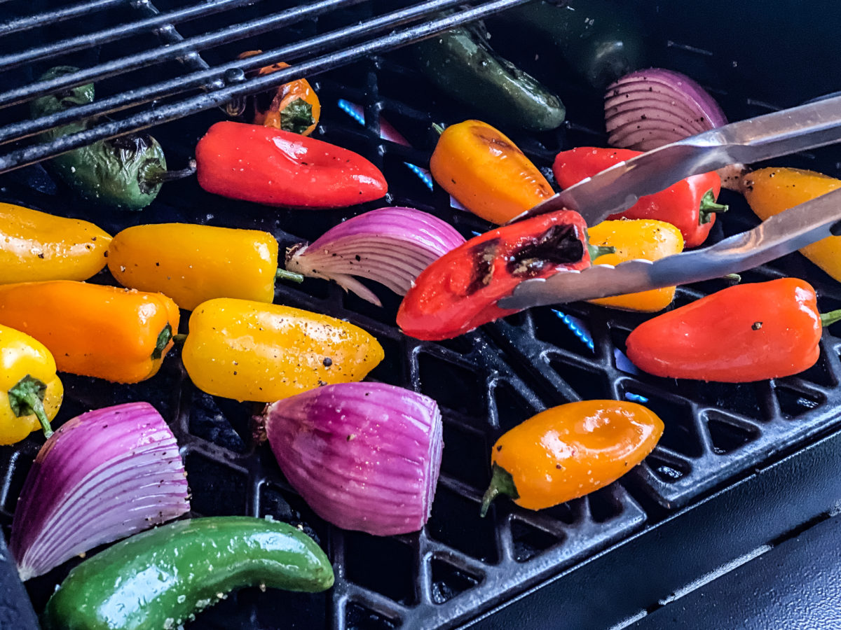 Grilling mini Aurora Bites and purple onions