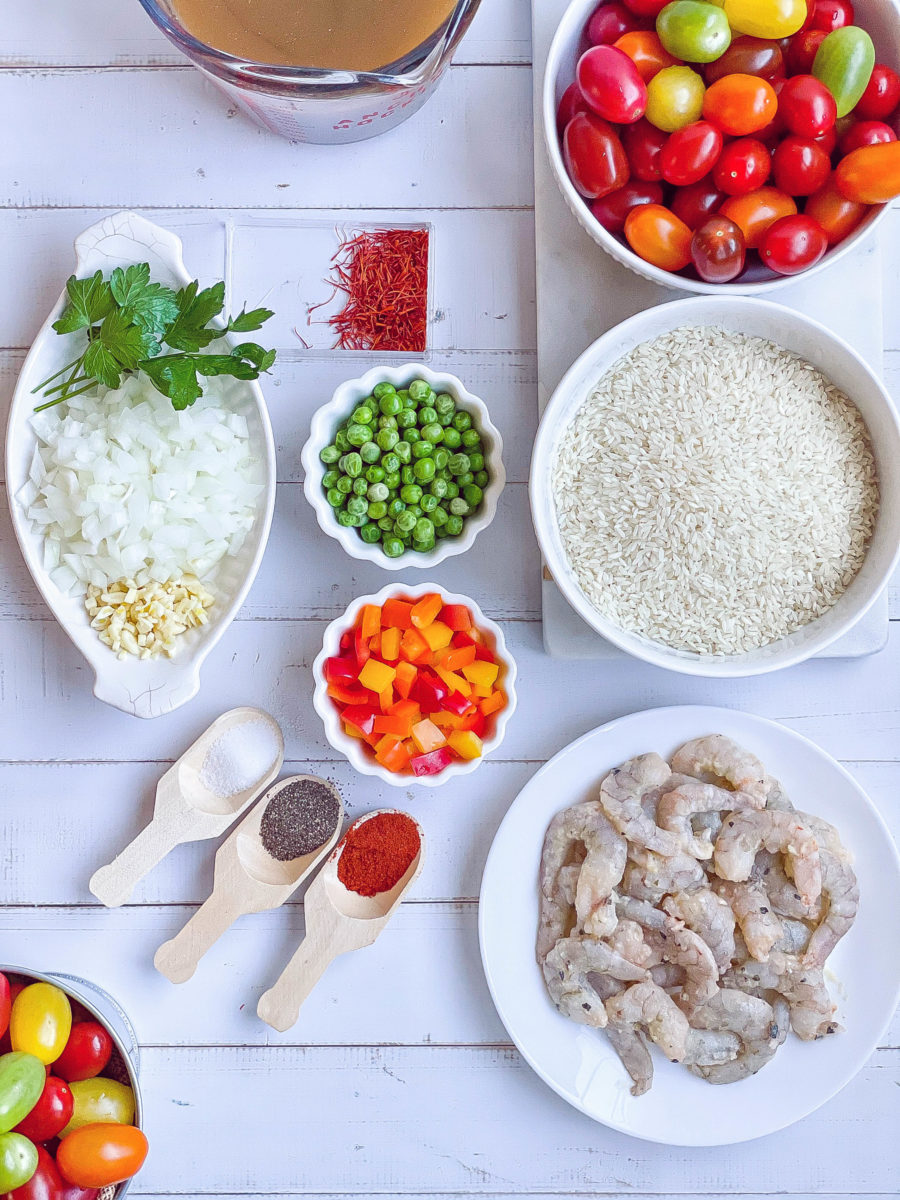 Paella recipe ingredients in bowls