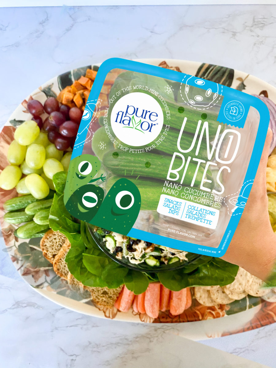 person holding Uno Bites package